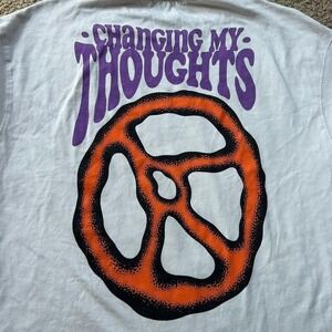 White Zara "Changing My Thoughts" cotton tee with peace sign design